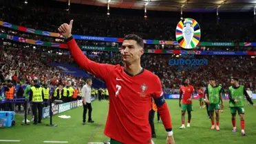 Cristiano Ronaldo does a thumbs up to the crowd as he wears the Portugal jersey and the EURO logo is next to him. (Source: UEFA, GOATTWORLD X)