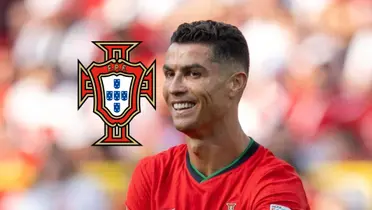 Cristiano Ronaldo smiles while he wears the Portugal national team jersey and the Portugal national team badge is next to him. (Source: GOATTWORLD X)