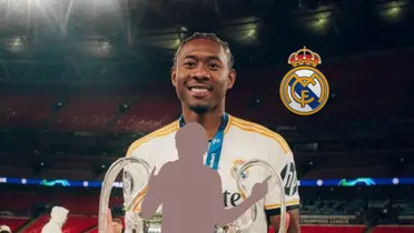 David Alaba smiles and hold the Champions League trophy while the Real Madrid badge is next to him and a mystery player is below him. (Source: David Alaba X)