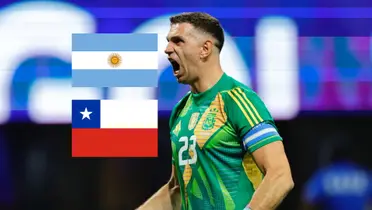 Emiliano Martinez shouts with joy as he wears the Argentina goalkeeper jersey; the Argentina and Chile flags are next to him. (Source: All About Argentina X)