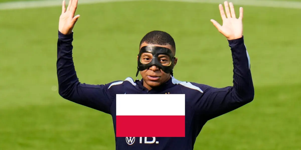 Kylian Mbappé raises his hands up while wearing a black mask and the Poland flag is in the middle. (Source: AP)