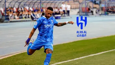 Neymar is about to kick the ball as he wears the Al Hilal kit and the Al Hilal badge is next to him. (Source: AFPPIX)